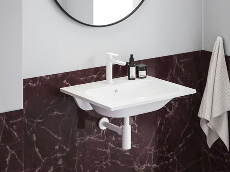 Bílé nábytkové umyvadlo Ravak Chrome Slim 60 x 49 cm z litého mramoru s přepadem