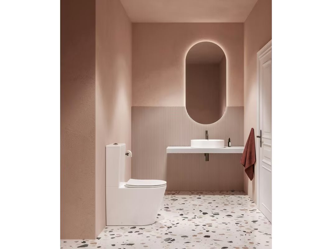 Bílé volně stojící WC kombi Ravak Elegant RimOff se sedátkem SoftClose a duálním splachováním 3/6 l.