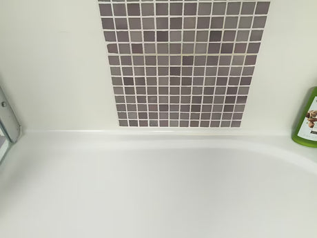 Montážní sada Ravak 10° v bílé barvě pro instalaci a utěsnění sprchové vaničky do rohu