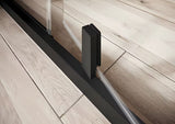 Ravak Nexty sprchové dveře 120 cm v černém provedení s čirým sklem a pivotovým otevíráním.