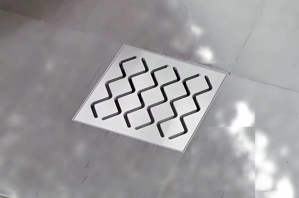 Podlahová vpusť Ravak SN501 s plastovým tělem a nerezovou mřížkou, průměr 10,5 cm.