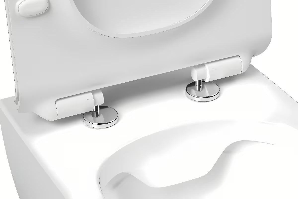 Bílé WC sedátko Ravak Vita Slim z duroplastu se systémem SoftClose pro tiché dovírání