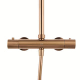 Sprchový systém SAT Aurum s termostatickou baterií v provedení rose gold brushed s hlavovou a ruční sprchou.