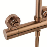 Sprchový systém SAT Aurum s termostatickou baterií v provedení rose gold brushed s hlavovou a ruční sprchou.