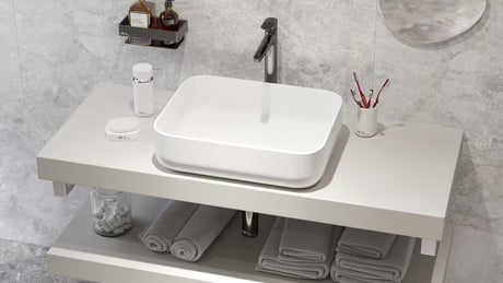 Bílé keramické oválné umyvadlo na desku SAT Infinitio bez přepadu 50 x 39 cm