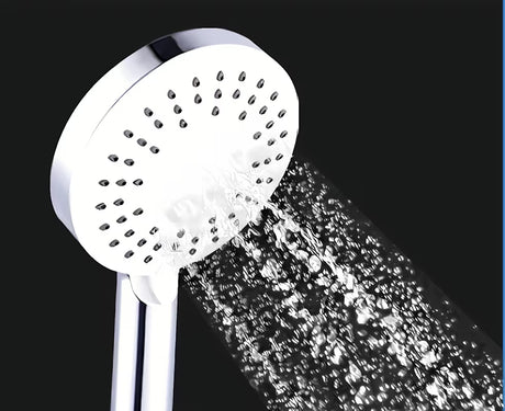 Bílá ruční sprcha SIKO s kulatým designem, průměr 12 cm, se samočisticími tryskami