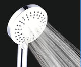 Bílá ruční sprcha SIKO s kulatým designem, průměr 12 cm, se samočisticími tryskami