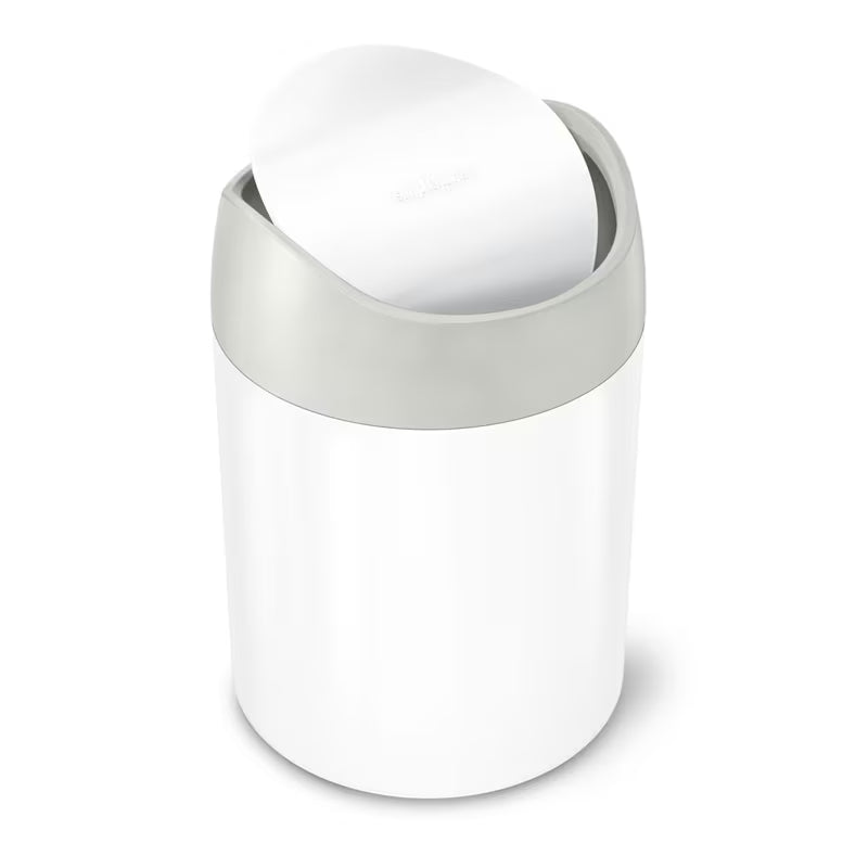 Stolní odpadkový koš Simplehuman Mini bin v provedení bílá ocel s vyklápěcím víkem