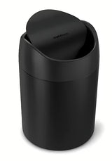 Černý stolní odpadkový koš Simplehuman Mini s vyklápěcím víkem a objemem 1,5 l.