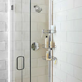 Nastavitelná sprchová tyč Simplehuman Shower caddy s drátěnými poličkami do rohu v nerezovém provedení.