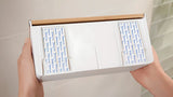 Bílá nástěnná polička tesa Baboo bez vrtání s lepicí technologií tesa Powerstrips Waterproof