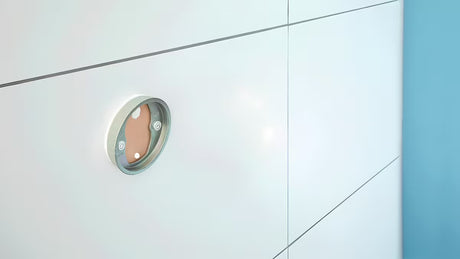 Samolepicí držák toaletního papíru Tesa Moon v kartáčované oceli s kulatým designem