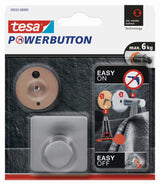 Háček Tesa PowerButton Classic z kartáčované nerezové oceli pro montáž bez vrtání.