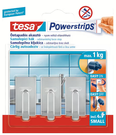 Chromový háček Tesa Powerstrips pro upevnění bez vrtání na hladké pevné povrchy.