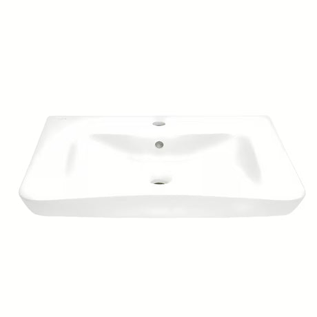 Bílé závěsné bezbariérové umyvadlo Vitra 65x56 cm z keramiky s přepadem a otvorem pro baterii uprostřed.