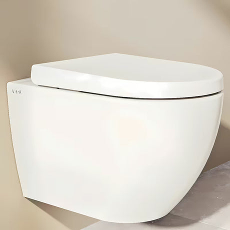 Bílé WC sedátko Vitra Integra z duroplastu s kovovými panty a uchycením se skrytým provedením