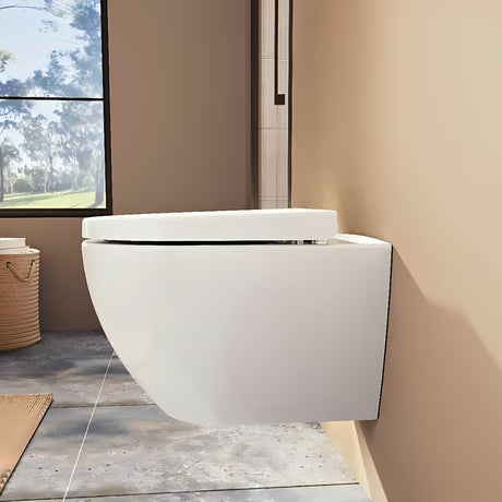 Bílé WC sedátko Vitra Integra z duroplastu se SoftClose a kovovými panty se skrytým uchycením.