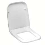 Bílé WC sedátko Vitra Shift z duroplastu se SoftClose a kovovými panty se skrytým uchycením.