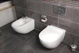 Bílé závěsné WC VitrA Shift bez splachovacího okruhu se skrytým uchycením a oblým tvarem.