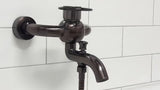 WF Industrial páková nástěnná vanová baterie se sprchovým setem v povrchu olejem gumovaný bronz dark-metal.